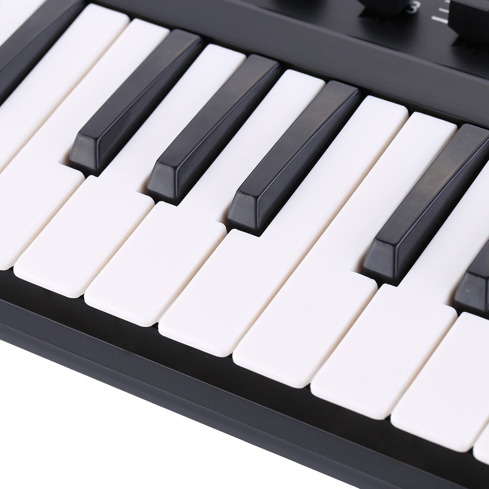 Portable 25-Key USB MIDI Keyboard and Drum Pad by HitMyNeed