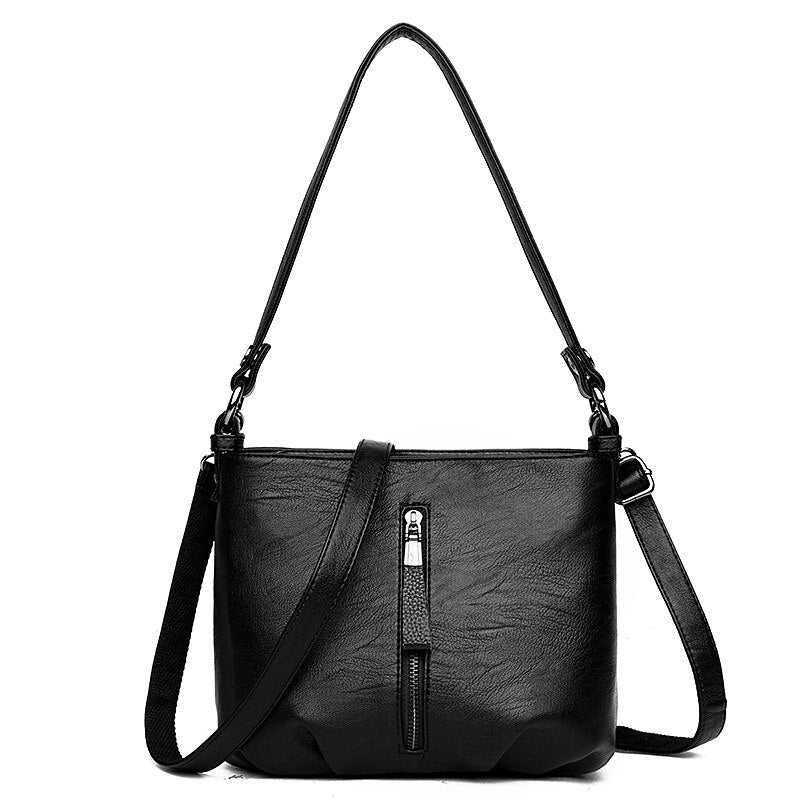 Women's Genuine Leather Sling Handbag by HitMyNeed