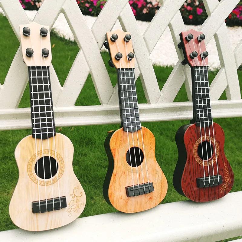 4-String Kids Ukulele Toy Mini Guitar 25cm by HitMyNeed
