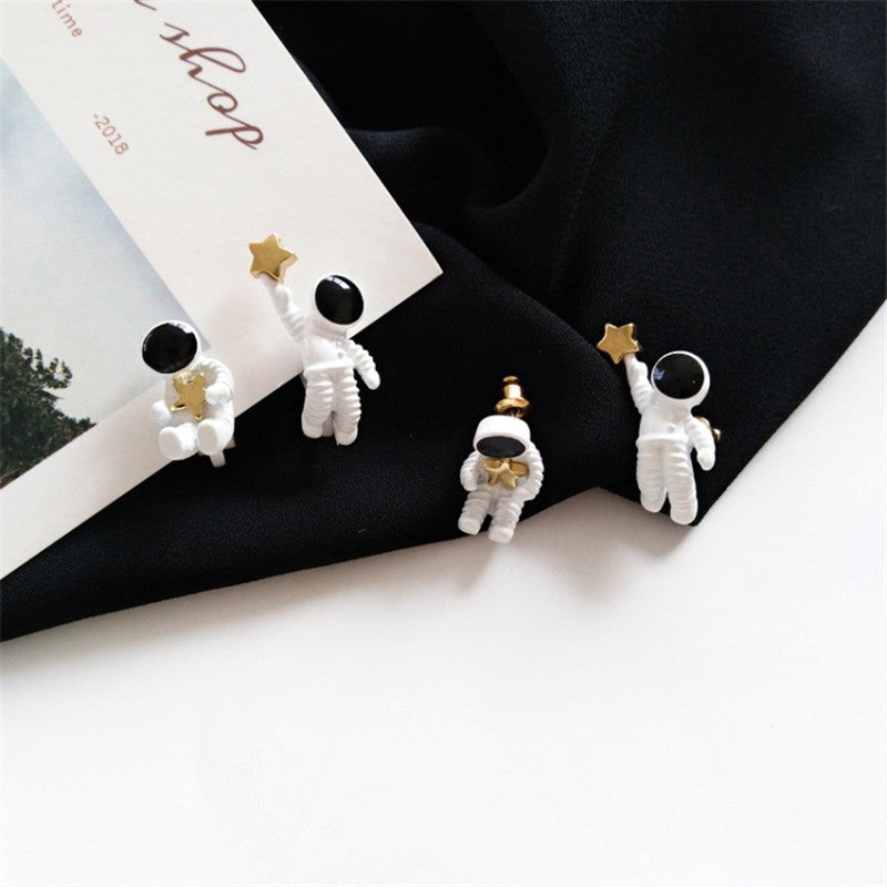 Asymmetrical Astronaut Stud Earrings (1 Pair) by HitMyNeed
