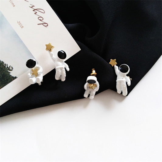 Asymmetrical Astronaut Stud Earrings (1 Pair) by HitMyNeed
