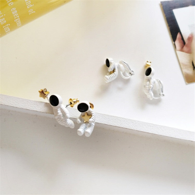 Asymmetrical Astronaut Stud Earrings (1 Pair) by HitMyNeed