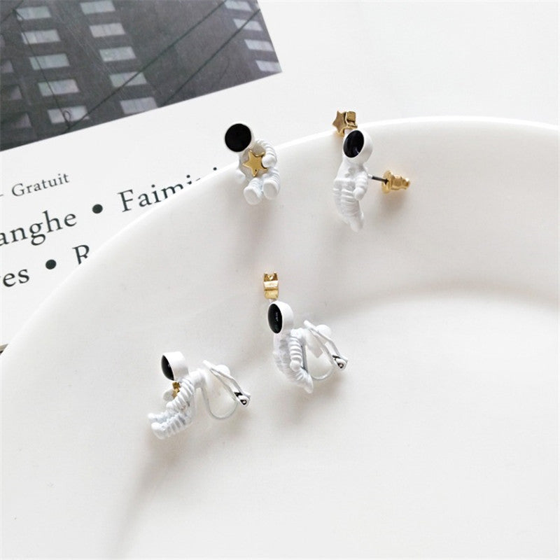 Asymmetrical Astronaut Stud Earrings (1 Pair) by HitMyNeed