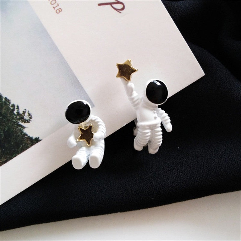 Asymmetrical Astronaut Stud Earrings (1 Pair) by HitMyNeed