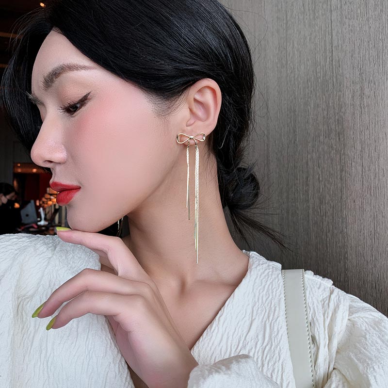 Classic Gold Bow Drop Earrings by HitMyNeed