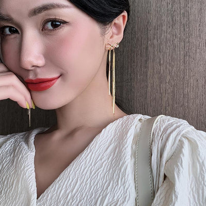 Classic Gold Bow Drop Earrings by HitMyNeed