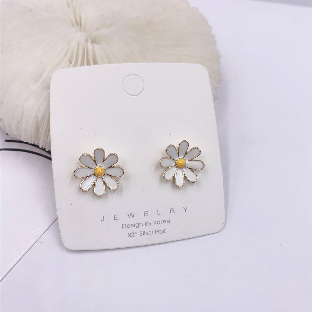 Dainty Daisy Stud Earrings for Everyday Wear by HitMyNeed