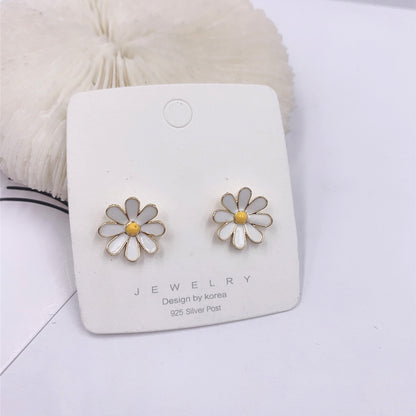 Dainty Daisy Stud Earrings for Everyday Wear by HitMyNeed