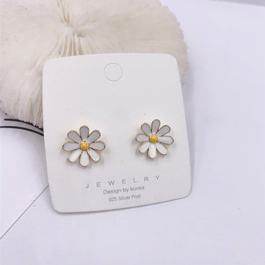 Dainty Daisy Stud Earrings for Everyday Wear by HitMyNeed