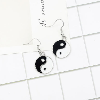 Dangling Metal Yin and Yang Earrings by HitMyNeed