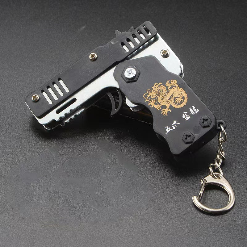 Folding Rubber Band Pistol Keychain Fidget Toy by HitMyNeed