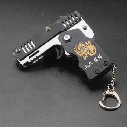 Folding Rubber Band Pistol Keychain Fidget Toy by HitMyNeed