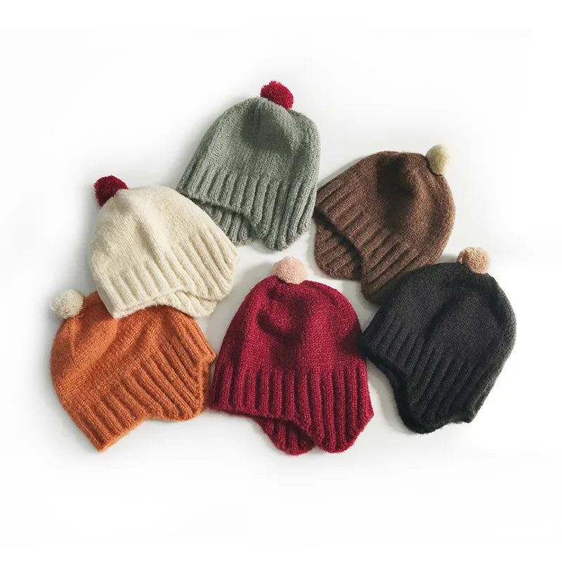 Infant Pom Hat with Ear Flaps for Winter Warmth by HitMyNeed
