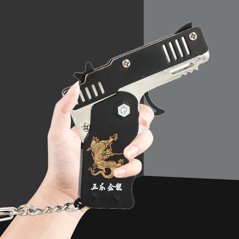 Keychain Rubber Band Shooting Toy Pistol by HitMyNeed