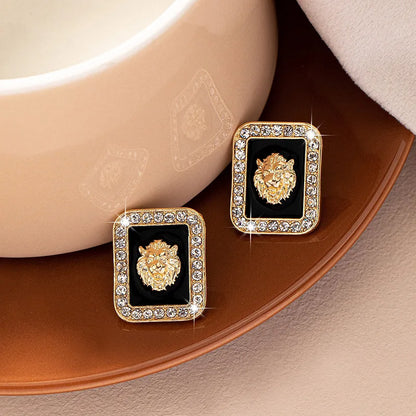 Lion Head Stud Earrings with Rhinestones by HitMyNeed