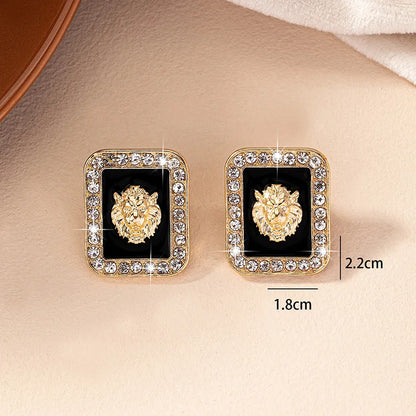 Lion Head Stud Earrings with Rhinestones by HitMyNeed