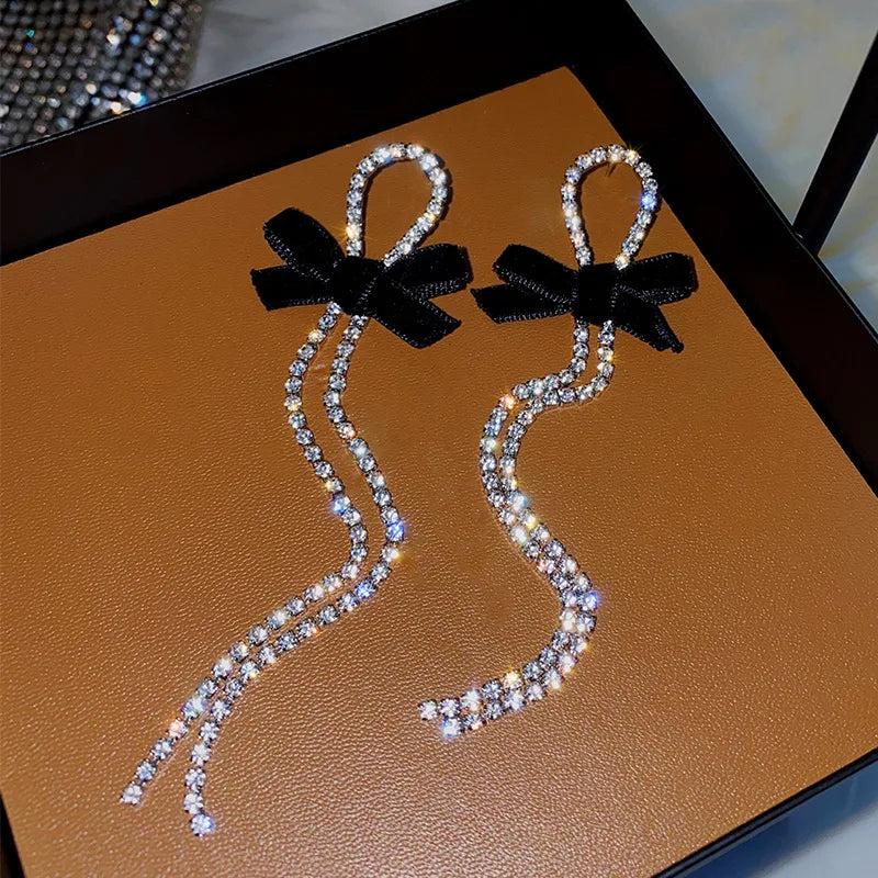 Long Crystal Drop Earrings with Black Bow by HitMyNeed