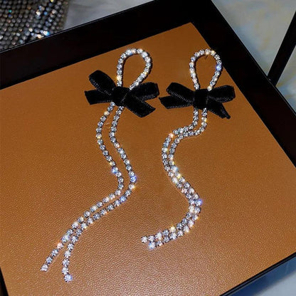 Long Crystal Drop Earrings with Black Bow by HitMyNeed