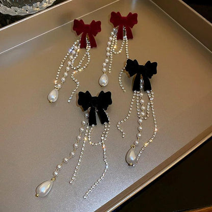 Long Pearl Drop Earrings with Bowknot Detail by HitMyNeed