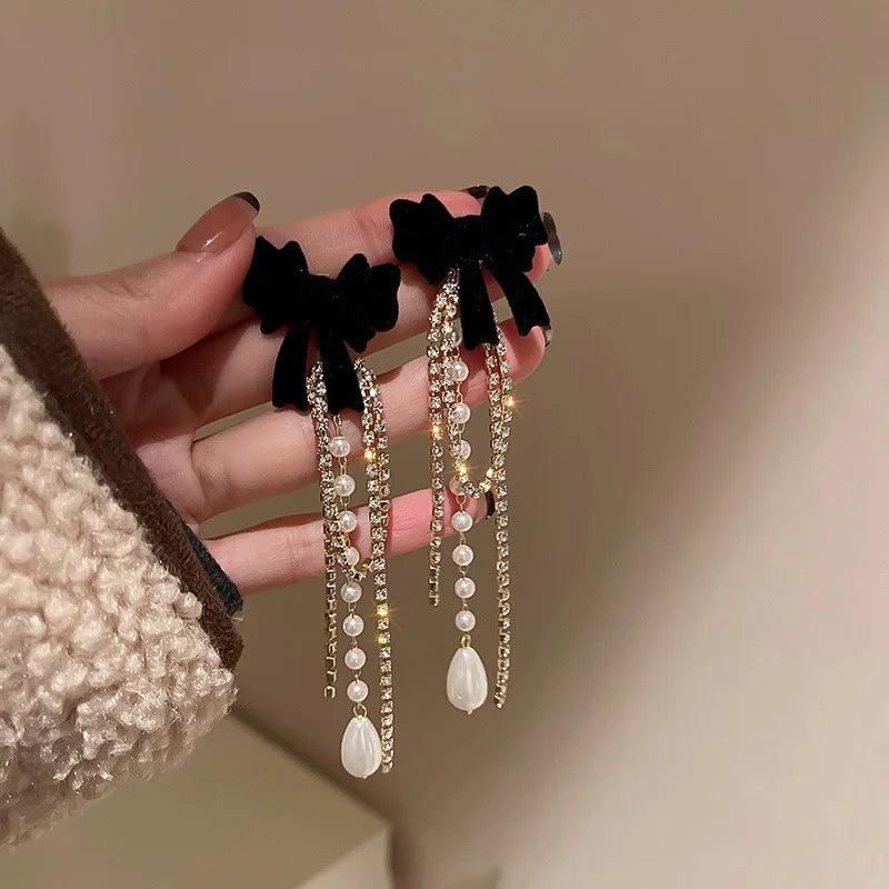 Long Pearl Drop Earrings with Bowknot Detail black by HitMyNeed