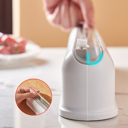 Magnetic Cling Film Holder with Built‑In Cutter by HitMyNeed
