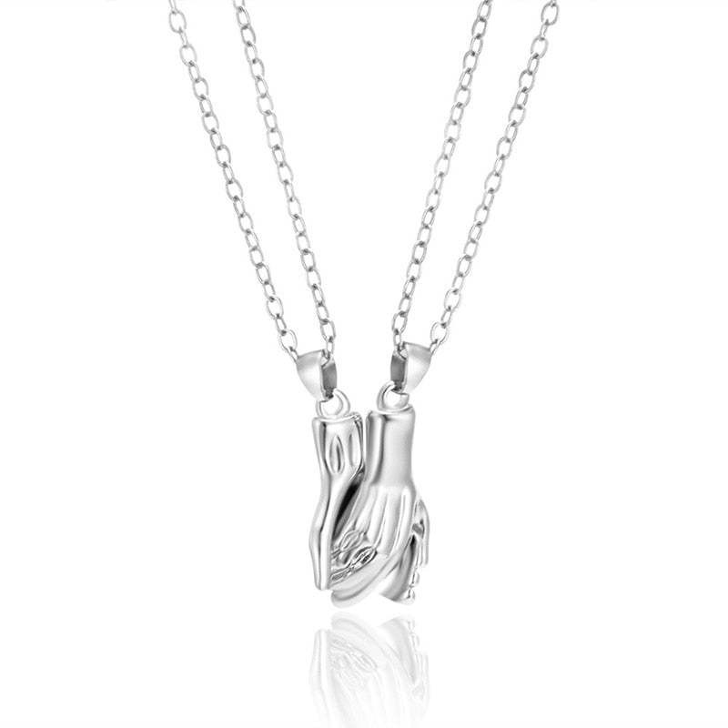 Magnetic Holding Hands Couple Necklace Set by HitMyNeed