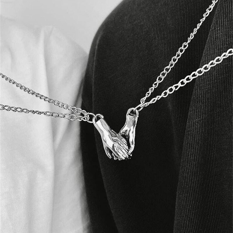 Magnetic Holding Hands Couple Necklace Set by HitMyNeed
