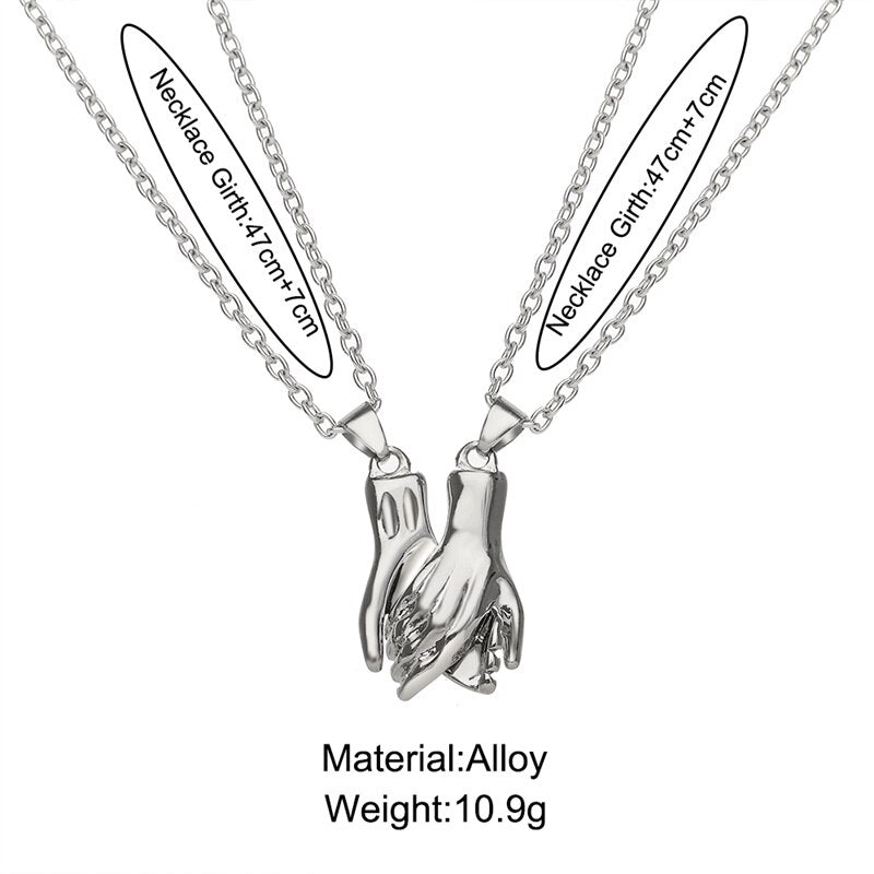 Magnetic Holding Hands Couple Necklace Set by HitMyNeed