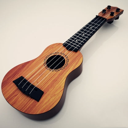 Mini 4-String Ukulele Toy for Kids - Beginner Musical Instrument (35cm) by HitMyNeed