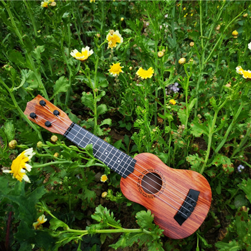 Mini 4-String Ukulele Toy for Kids - Beginner Musical Instrument (35cm) by HitMyNeed