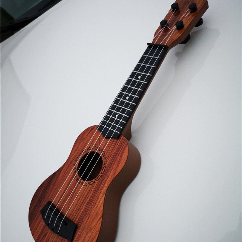 Mini 4-String Ukulele Toy for Kids - Beginner Musical Instrument (35cm) by HitMyNeed