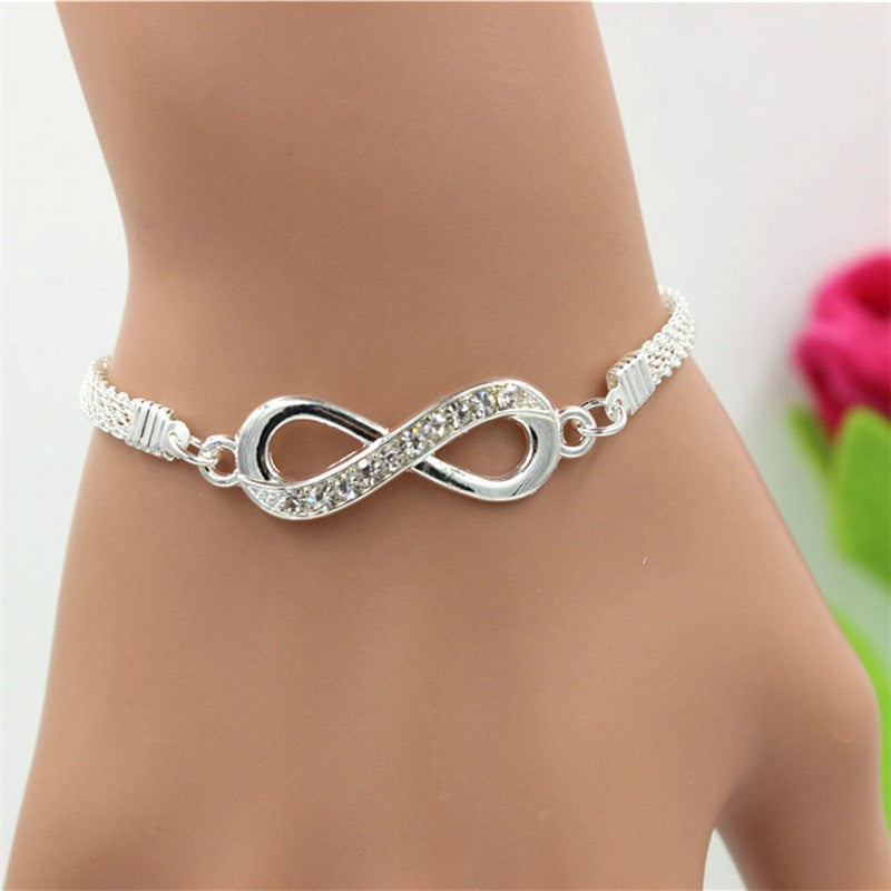 Rhinestone Infinity Bracelet with Number 8 Charm by HitMyNeed
