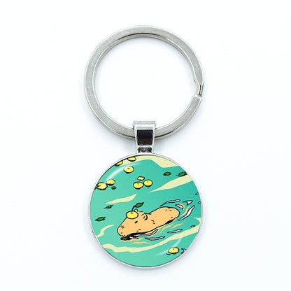 Round Metal Capybara Keychain with Glass Charm 2 by HitMyNeed