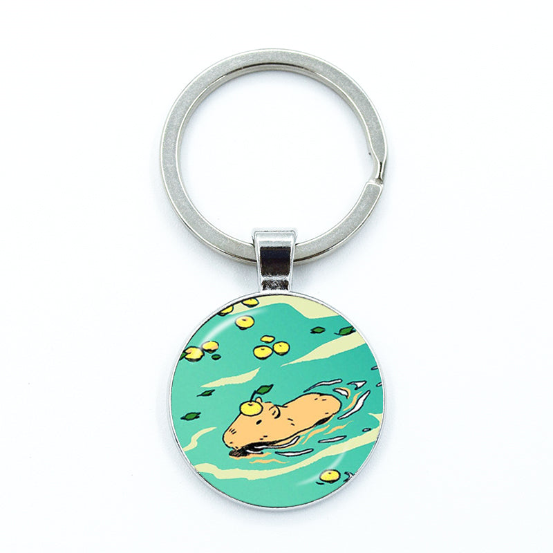 Round Metal Capybara Keychain with Glass Charm by HitMyNeed
