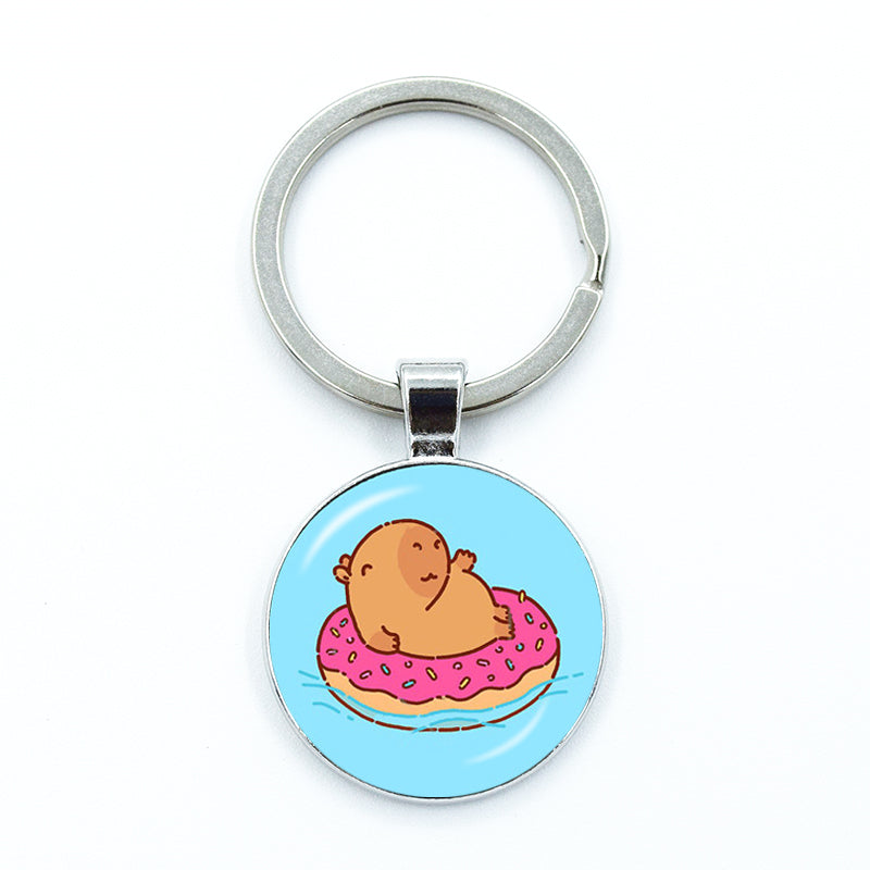 Round Metal Capybara Keychain with Glass Charm by HitMyNeed