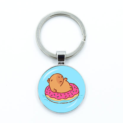 Round Metal Capybara Keychain with Glass Charm by HitMyNeed