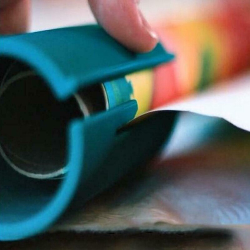 Sliding Wrapping Paper Cutter and Roll Organizer by HitMyNeed