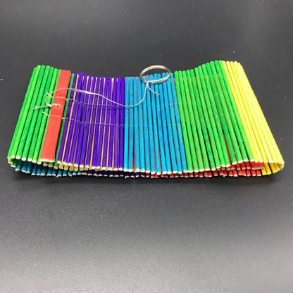 Spiral Rainbow Wooden Wind Chime by HitMyNeed