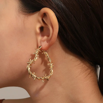 Stainless Steel Barbed Wire Heart Earrings by HitMyNeed