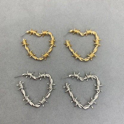 Stainless Steel Barbed Wire Heart Earrings by HitMyNeed