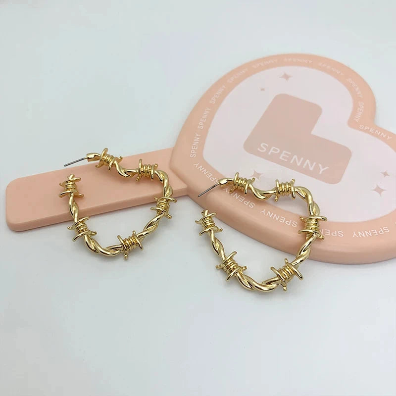 Stainless Steel Barbed Wire Heart Earrings gold by HitMyNeed