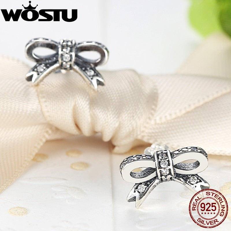 Sterling Silver Bow Stud Earrings with CZ Stones by HitMyNeed
