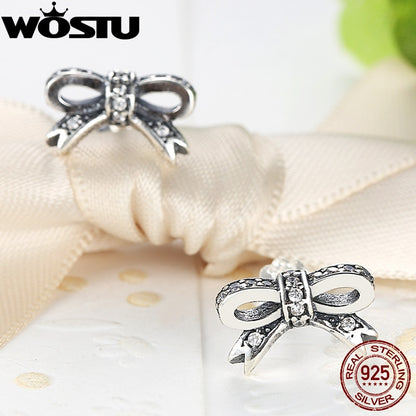 Sterling Silver Bow Stud Earrings with CZ Stones by HitMyNeed