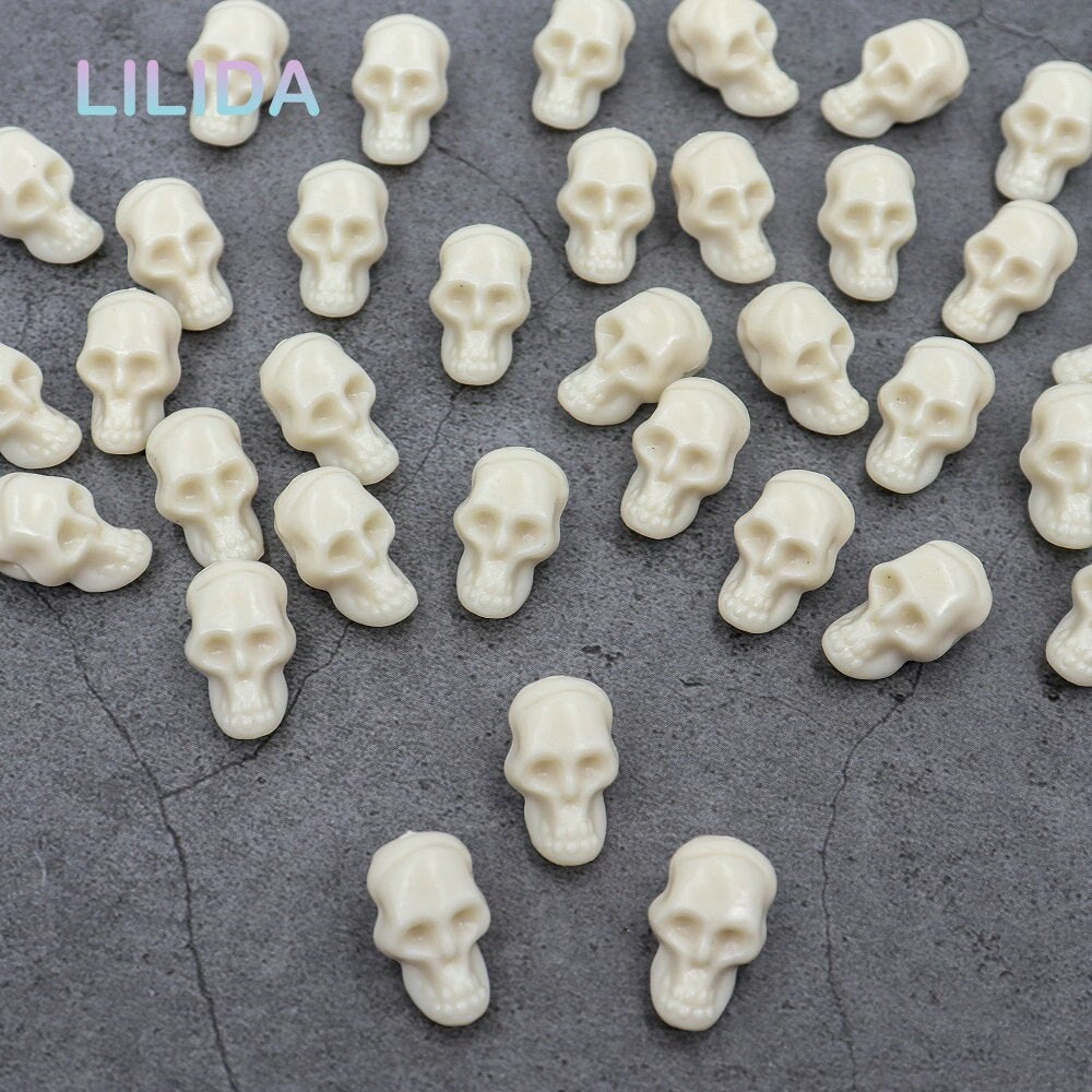 White Mini Plastic Skulls Decor Set (30 Pieces) by HitMyNeed