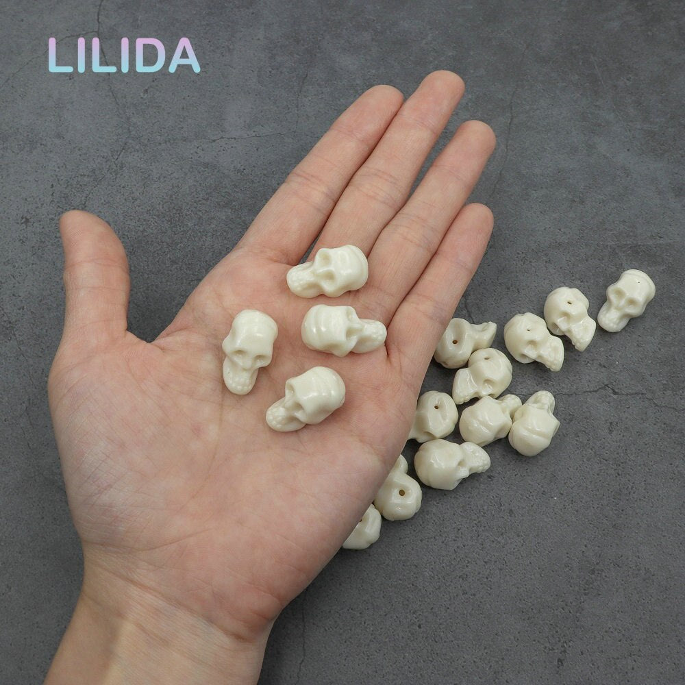 White Mini Plastic Skulls Decor Set (30 Pieces) by HitMyNeed