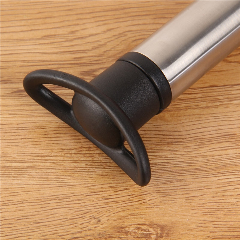 Wine Vacuum Pump with Bottle Stoppers by HitMyNeed