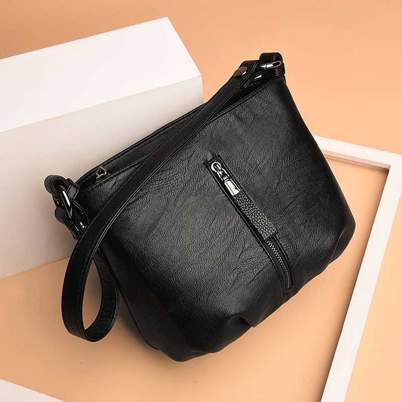 Women's Genuine Leather Sling Handbag by HitMyNeed