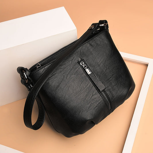 Women's Genuine Leather Sling Handbag by HitMyNeed