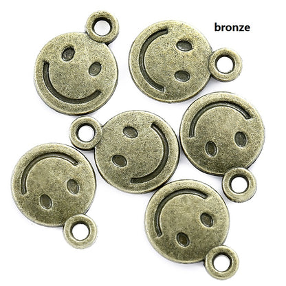 Zinc Alloy Smiley Pendants, 40-Pack (10x8mm) antique-bronze-plated by HitMyNeed